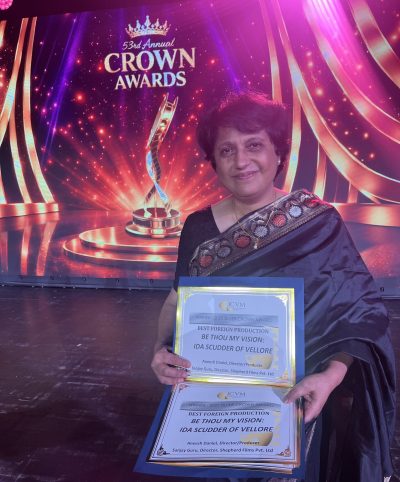 Film writer Dr. Reena George displays the winner’s certificate